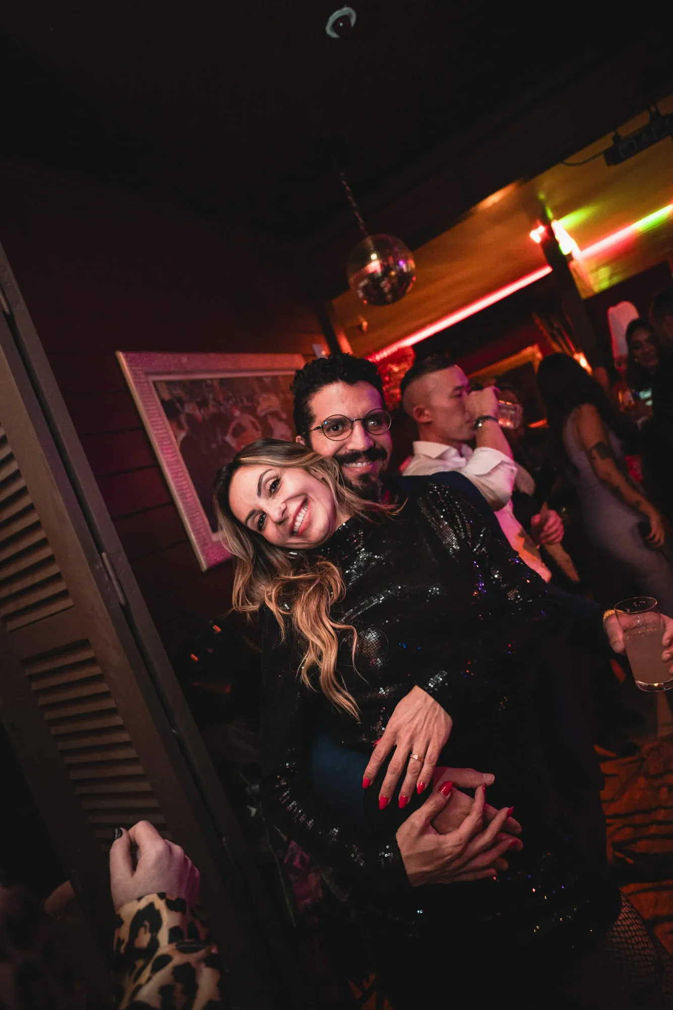 Guests celebrating an evening at Cabaret Le Luxe